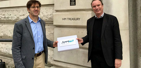 Professors Chris Griffiths and Jonathan Grigg outside the HM Treasury building in London