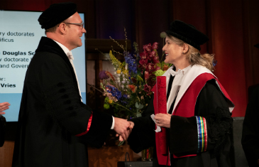 Professor Sionaidh Douglas-Scott receiving an honorary doctorate in her robes
