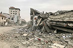 A destroyed street in Gaza following 7 October 2023