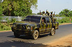 LTTE soldiers in a camouflage patterned car