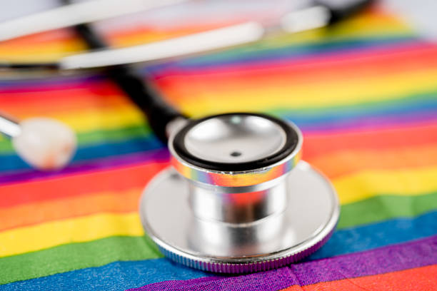 A photograph of a stethoscope on a rainbow flag
