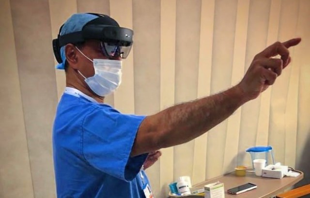 Professor Shafi Ahmed using smart glasses on his ward visits