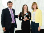 Aysel (centre) collecting her award from Fiona Bruce and David Bearfield, Director, European Personnel Selection Office, EU Careers