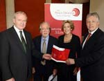 Mr Martin McGuinness (deputy First Minister), Professor Seán McConville, Dr Anna Bryson and Mr Peter Robinson (First Minister)