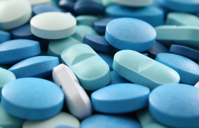Blue pills. Credit: FotografiaBasica/iStock.com