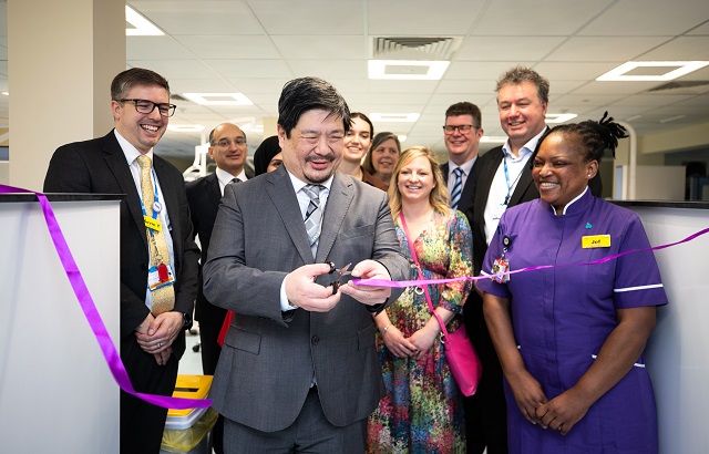 Dr Jason Wong, MBE, Interim Chief Dental Officer England, cuts the ribbon at the opening of the Kenworthy Road Dental Clinic