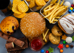 Selection of unhealthy foods and drink.Credit: happy_lark/iStock.com