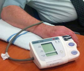 A patient has his blood pressure tested