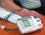 A patient has his blood pressure tested