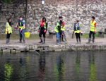 Students clearing litter from the canal
