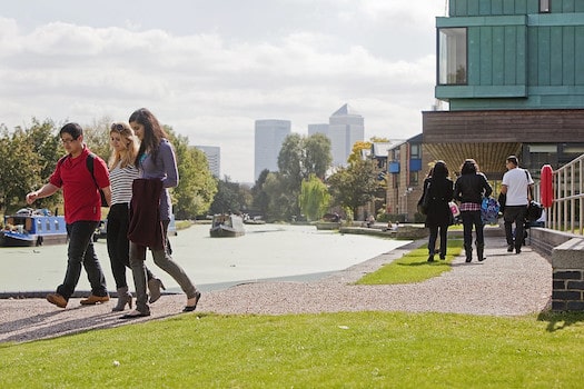 Students enjoying a walk along the canal at Mile End