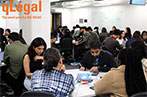 A table of qLegal students sat around a table in a workshop about clinical legal education.