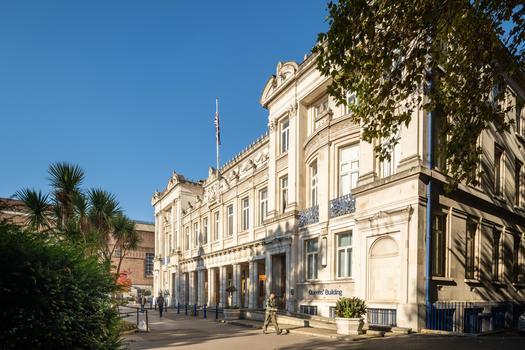Queens' Building in sunshine on the Queen Mary campus.