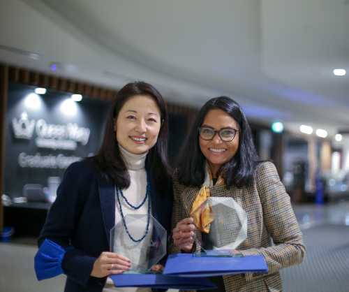 Dr Joanne Zhang and Dr Ishani Chandrasekara holding their Education Excellence Awardsawards