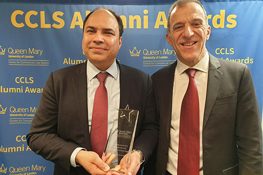 Ajit Mishra holding Chapter of the Year award with Ian Walden