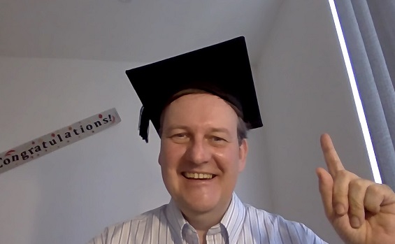 Man in graduation mortar board