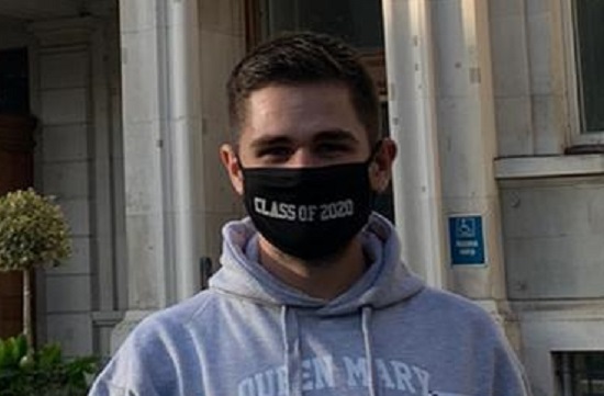 Man in hoodie wiearing black Class of 2020 facemask