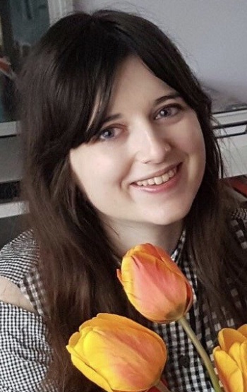 Woman holding orange tulips