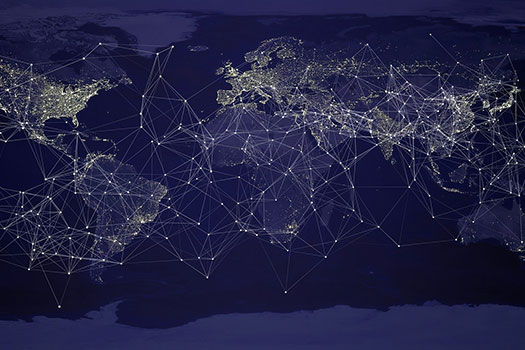 The Earth at night with lights on an connected dots