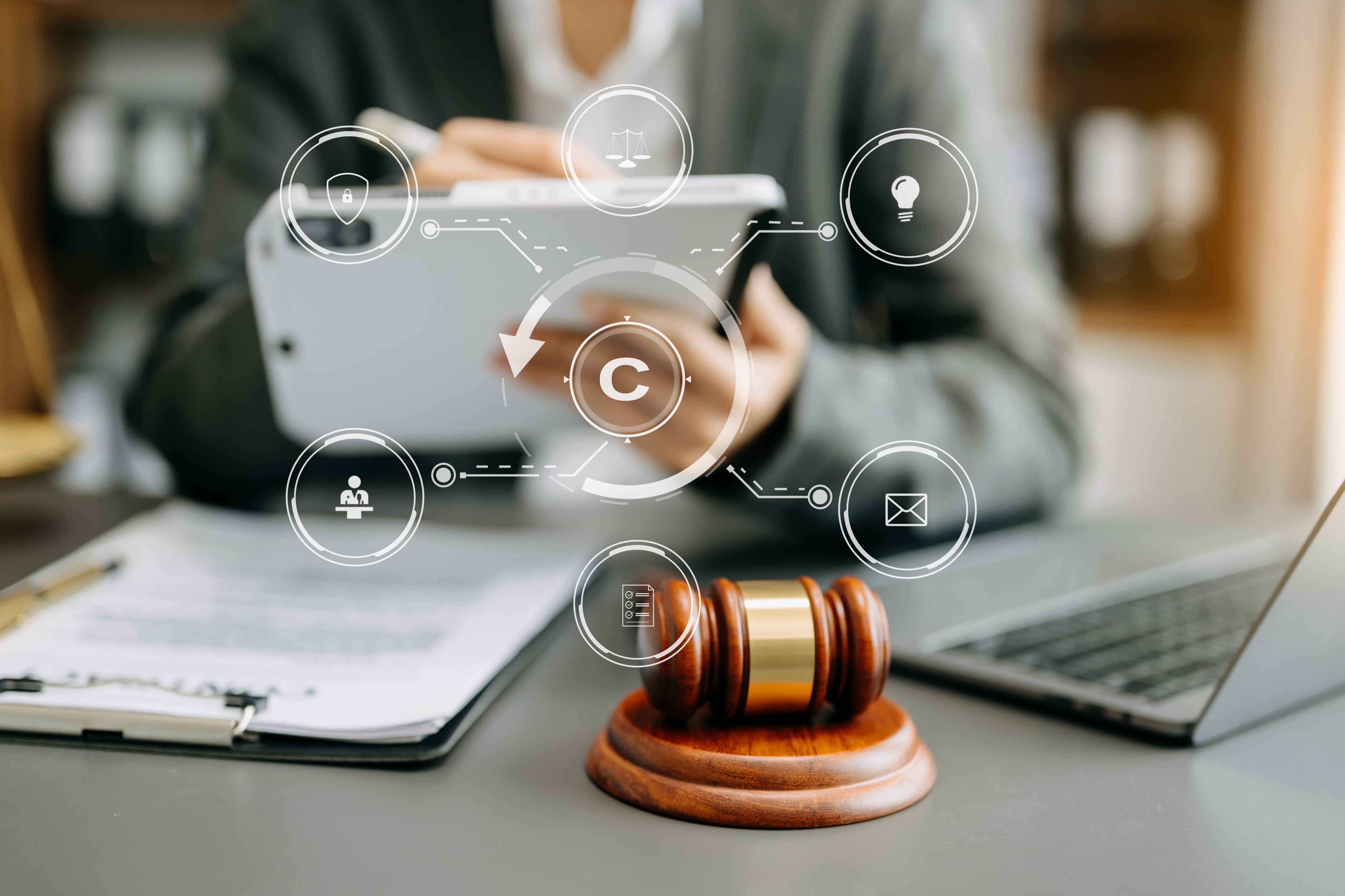 Gavel, woman, and tablet
