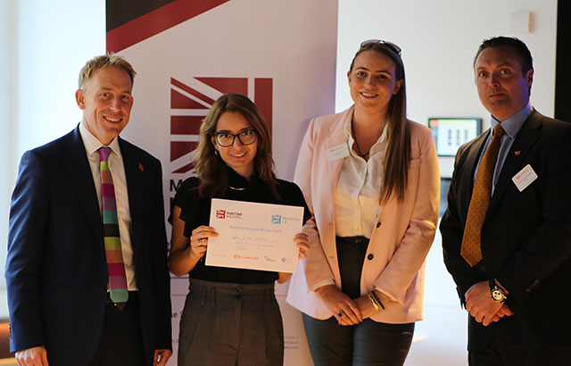 Dafni Eirini Melitsi holding her Maritime Master’s Competition award