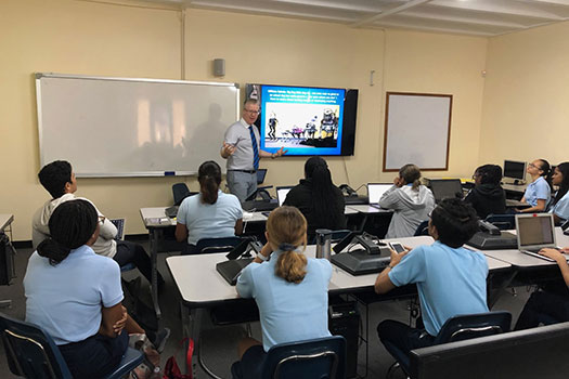 Professor Alan Dignam giving a lecture on Artificial Intelligence to high school students in Jamaica