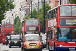 London buses and taxis on a busy street