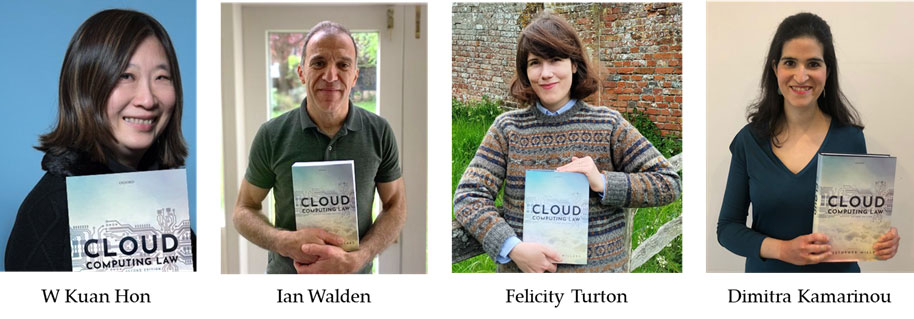 Authors holding copies of Cloud Computing Law, 2nd Edition.
