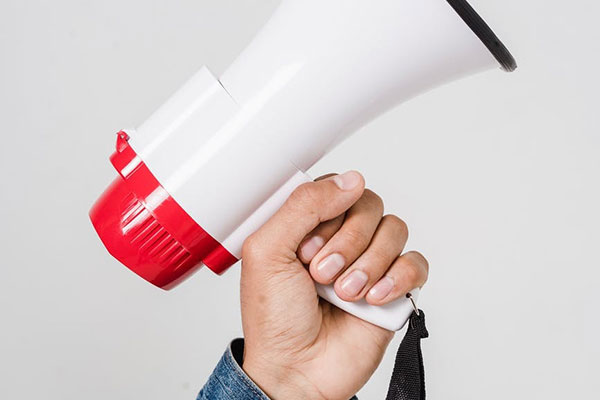 A person holding a megaphone