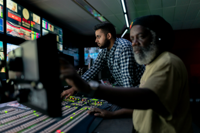 Broadcast engineers in studio. © This is Engineering