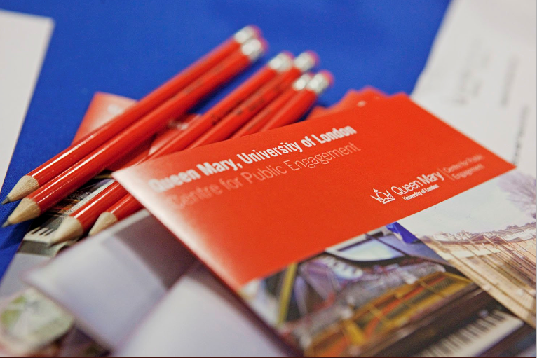 A stack of brochures and pencils branded with Centre for Public Engagement Logo