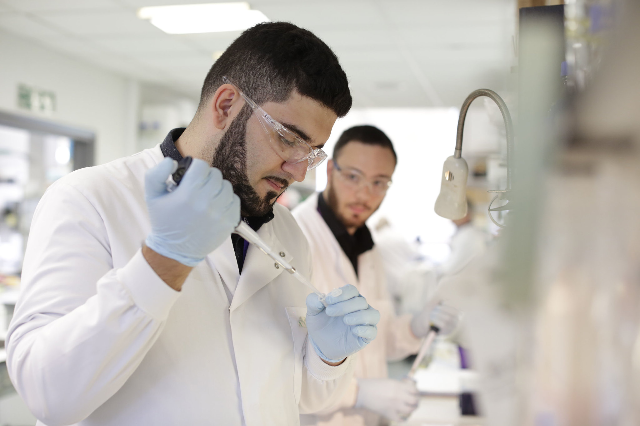 Male scientist conducting an experiment