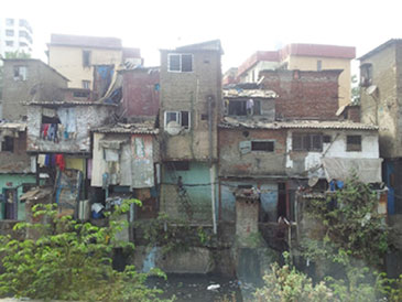 City Life – Fishing in the slums, hutments, Mumbai. © Sharon Ball