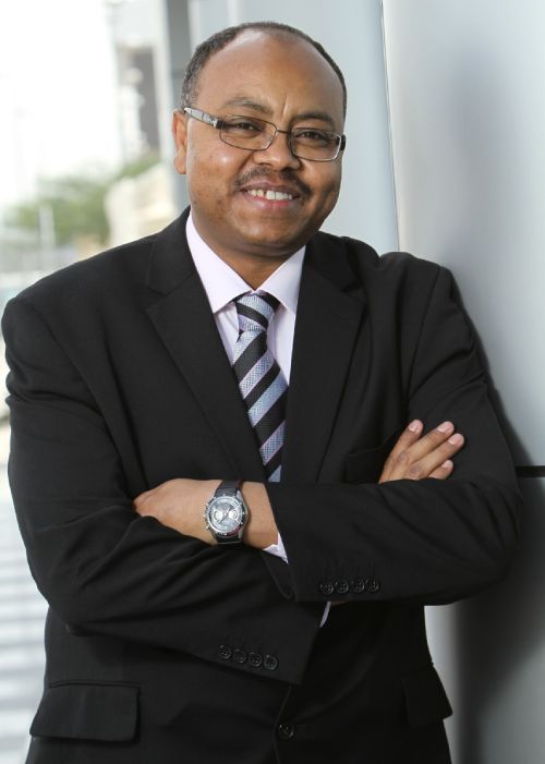 A portrait photograph of Professor Allam Ahmed