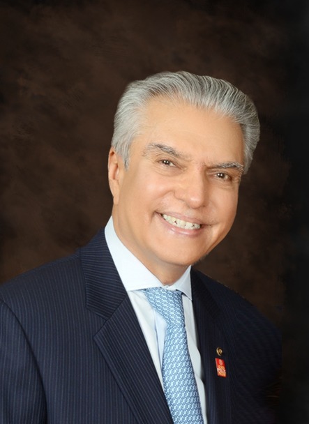 A portrait photograph of QMGPI Advisory Board member Aziz Memon