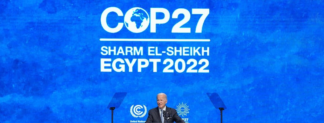 President Biden speaks at the 2022 United Nations Climate Change Conference with a COP27 logo above him