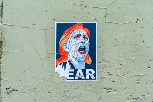 A defaced poster of Front National Leader Marine Le Pen