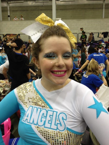 Photo of Rebecca Dooley in her QM Angels cheerleading uniform