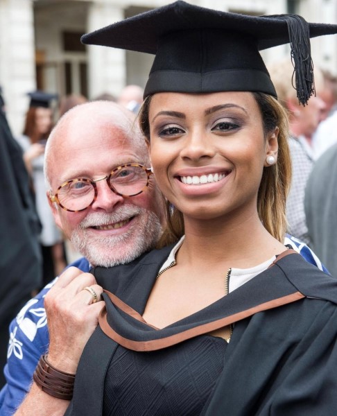 Photo of alumna, Keshia East, with her dad at graduation