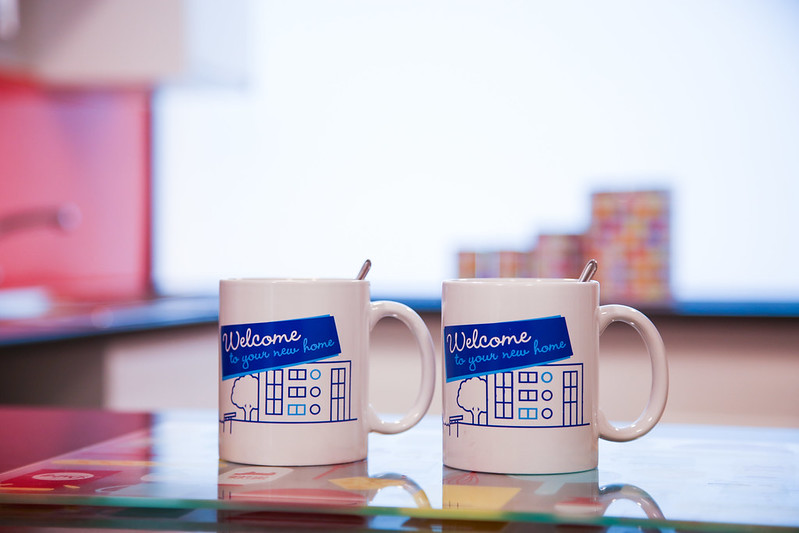 Two welcome to your new home mugs