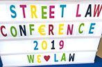 A banner saying: Street Law conference 2019 - We heart law