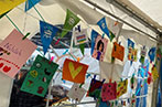 A bunch of decorated cards by children at the LAC's I Am You stall at the Queen Mary Festival of Communities.