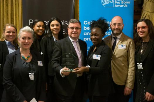 Legal Advice Centre and qLegal accepting their pro bono award