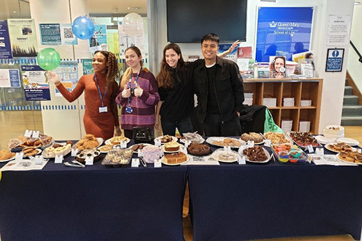 Queen Mary Legal Advice Team at their cake stand for the Legal Bake 2022