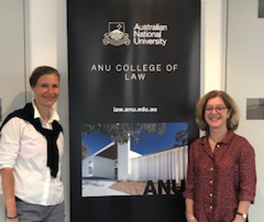 Queen Mary's Saskia Hufnagel and Penny Green standing either side of a ANU College of Law