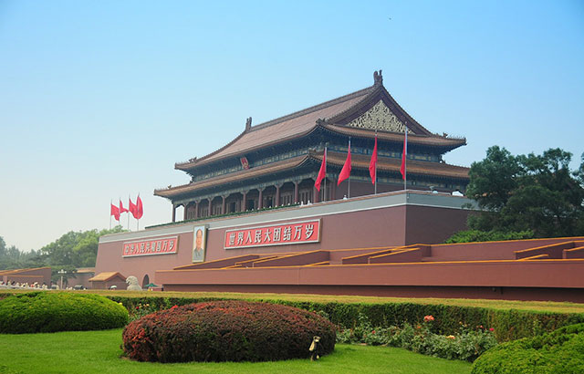Red flags flying in the Tiananmen Square, Beijing.