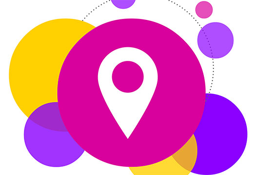 Big pink bubble with a location icon in the middle, surrounded by purple and yellow bubbles