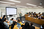 Thomas MacManus giving a lecture to a group of Queen Mary Undergraduate Law students