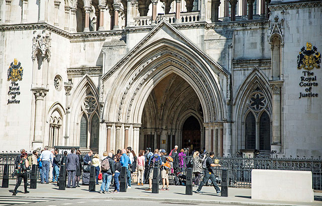 People outside the Royal Courts of Justice, London