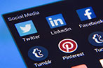 A phone screen displaying various social media icons